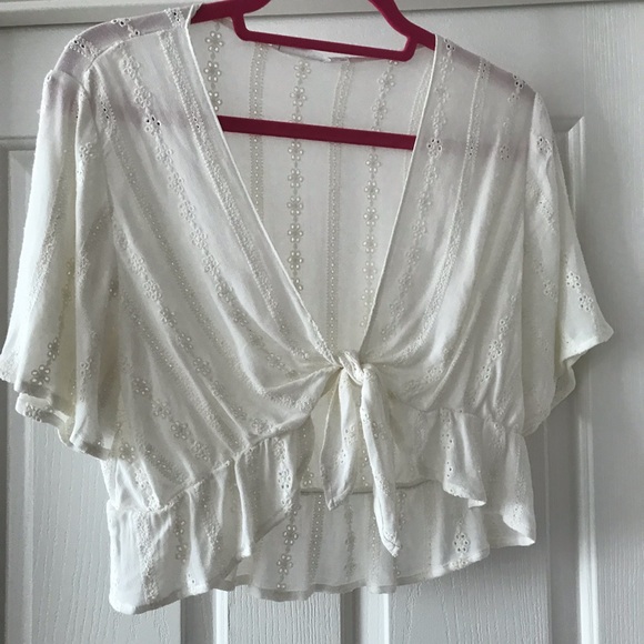 Brandy Melville Tops - SOLD Lace ruffle tie crop top